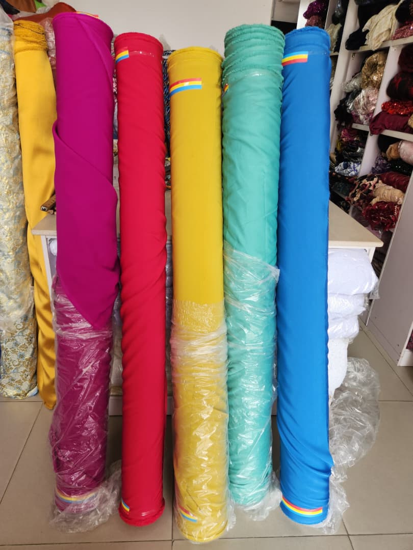 Rainbow Solid Crepe Fabric Roll Collection