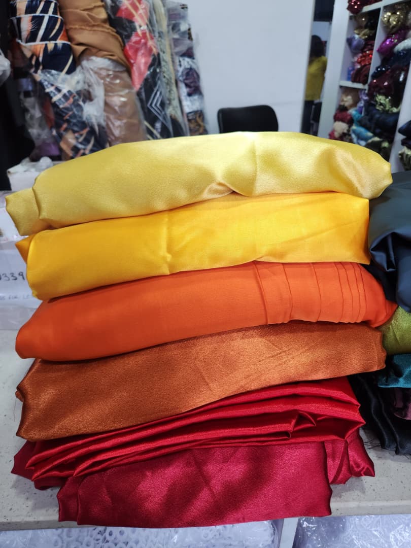 Warm Tone Lustrous Satin Fabric Stack